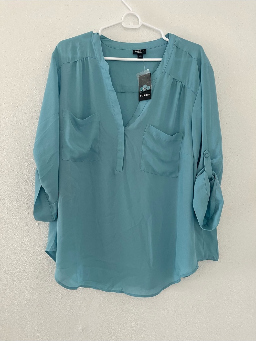torrid teal split-neck roll-tab tunic